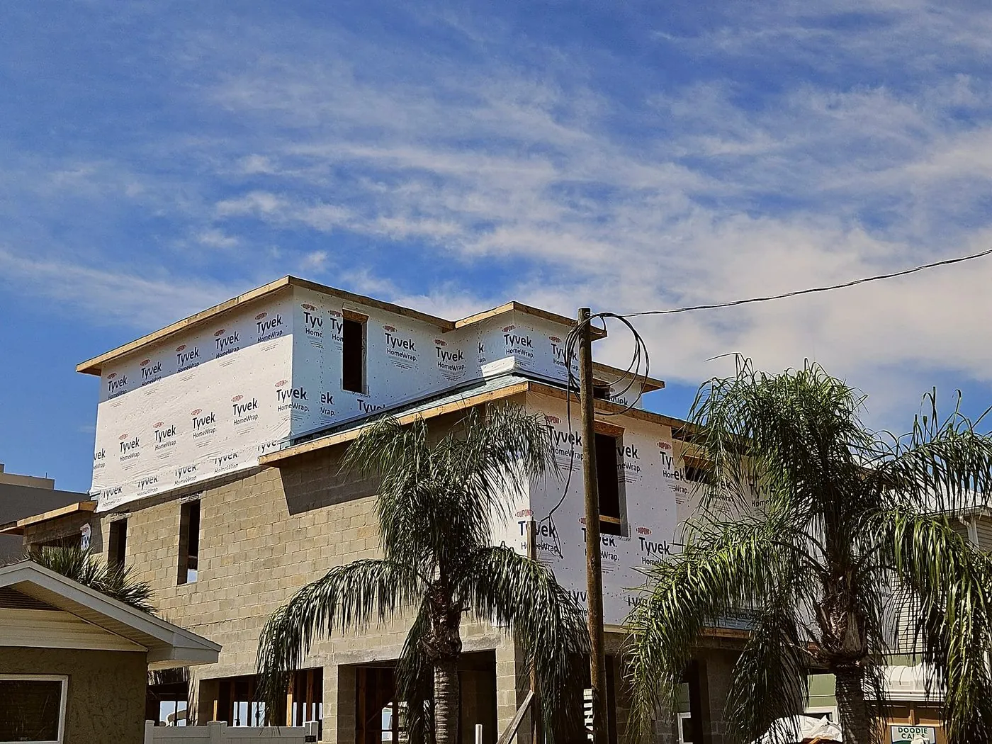House wrap on a three-story Central Florida elevation before cladding